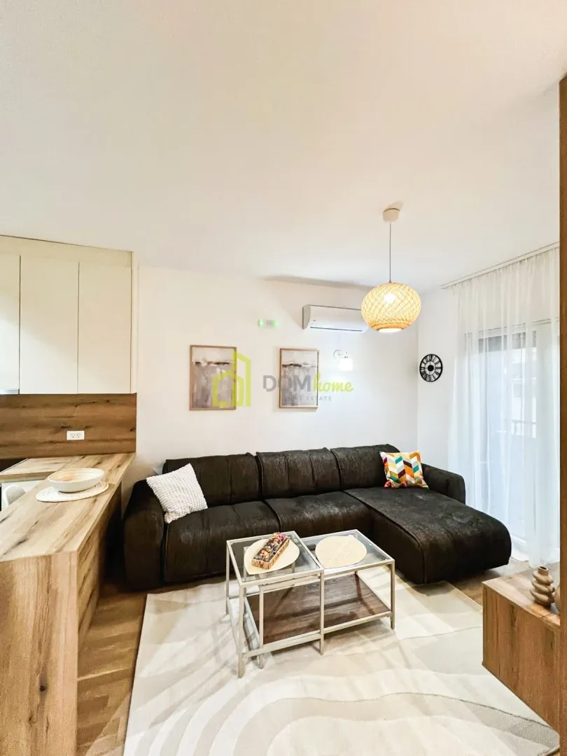 Living room with a sofa and coffee table.