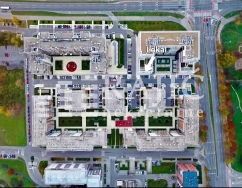 Aerial view of a residential complex with a marked location.
