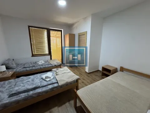 Bedroom with three beds and access to the terrace. - image 26