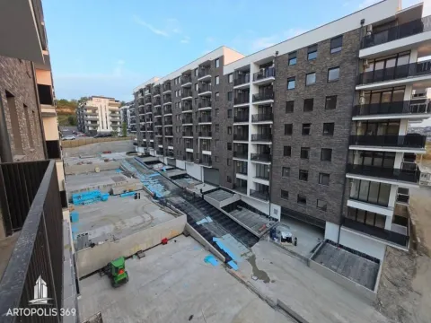 View from the terrace overlooking the courtyard and surrounding residential buildings. - image 11
