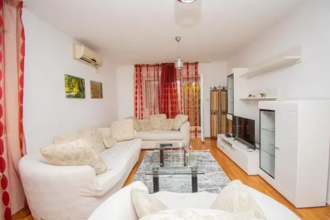 Bright living room with a sofa set. - image 2
