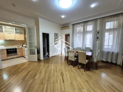 Living room with dining area and view of the kitchen. - image 5