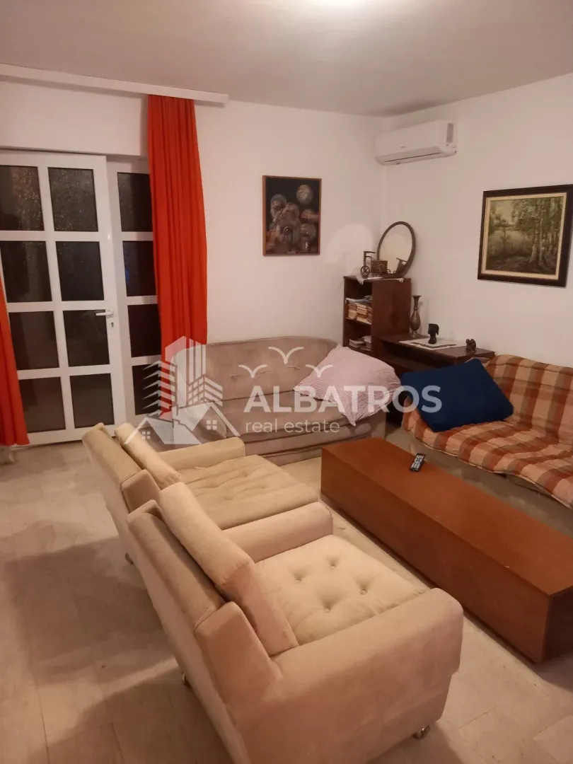 Furnished living room with sofas and a coffee table.