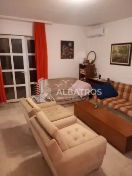 Furnished living room with sofas and a coffee table. - image 3