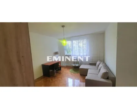 Living room with a sofa set and a desk by the window. - image 5