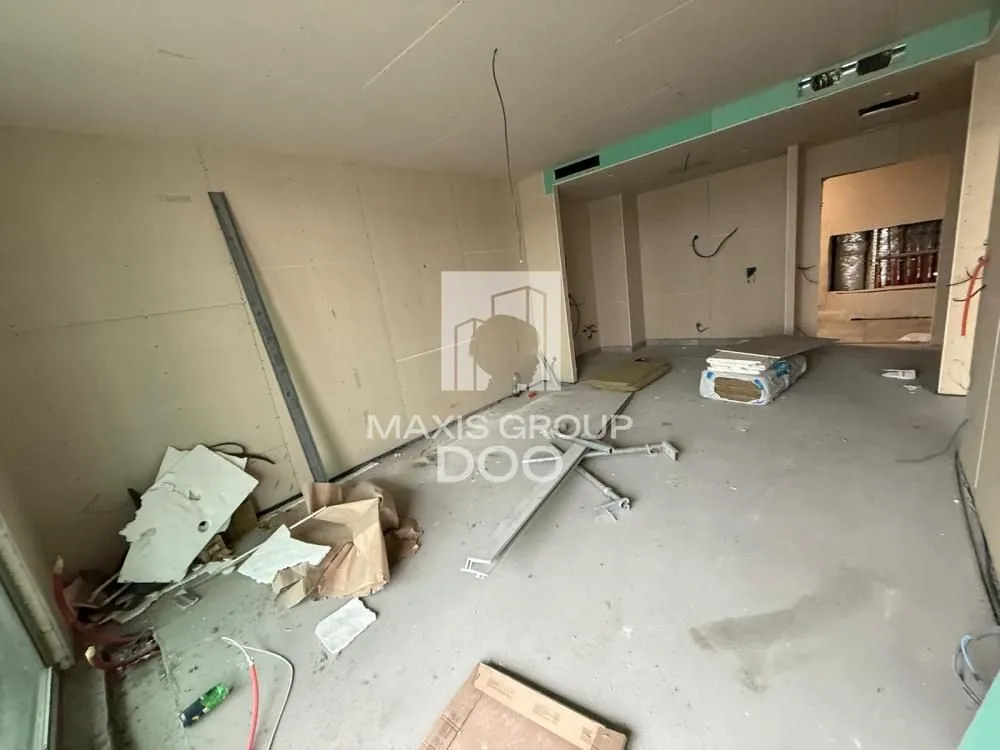 Interior of a property under construction with building materials.