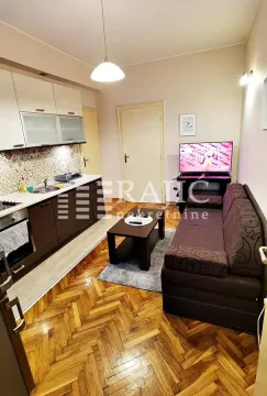 Living room combined with kitchen in a smaller apartment. - image 4