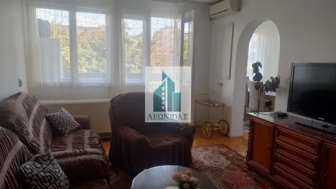 Living room with sofa set, TV and view of the windows. - image 2