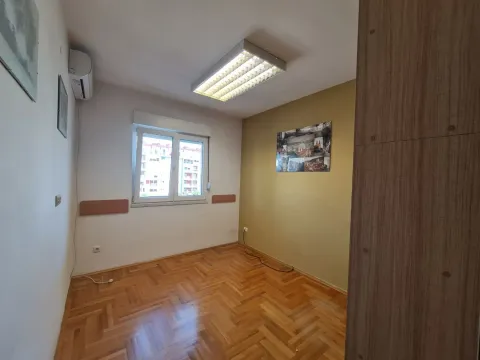 An empty room with parquet flooring and air conditioning. - image 6