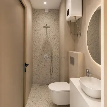 Modern bathroom with a shower enclosure, washbasin and toilet. - image 12