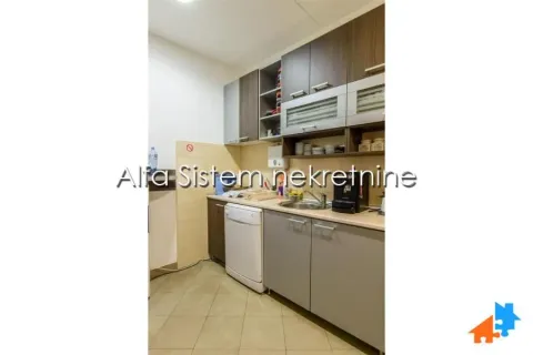 Kitchen equipped with cabinetry and home appliances. - image 14