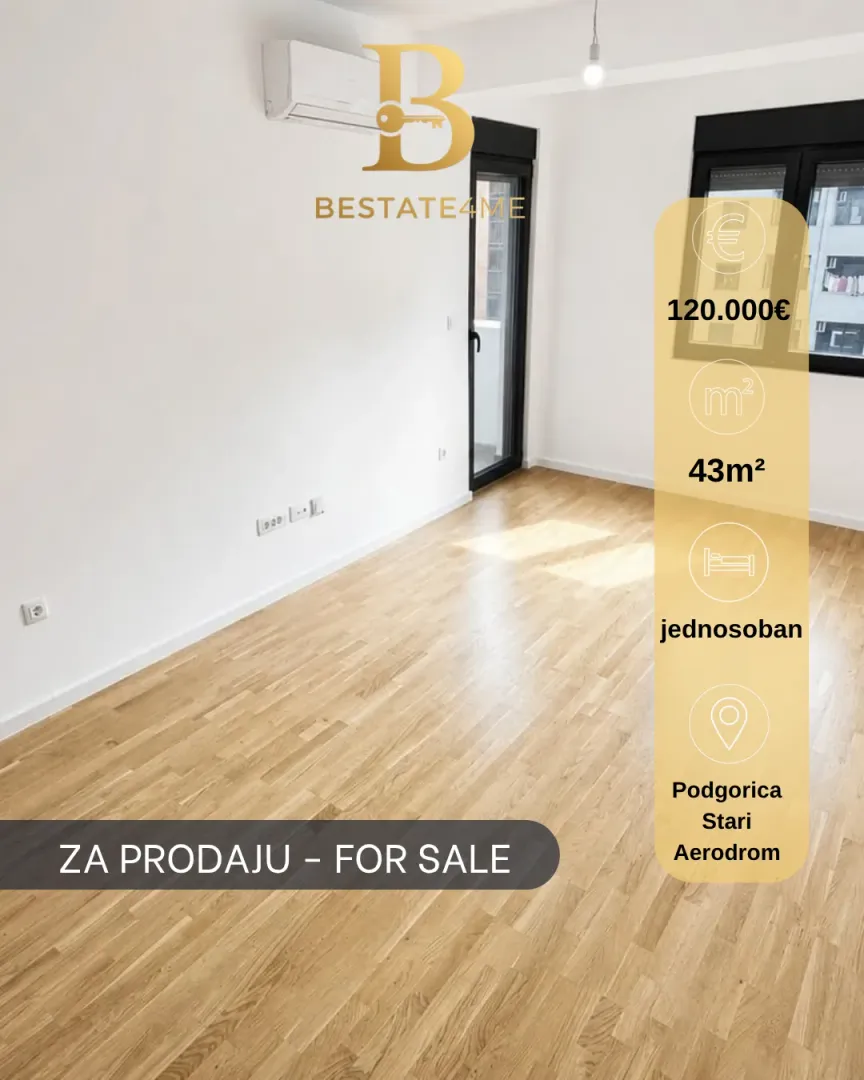 Prazna soba sa parketom i izlazom na terasu.