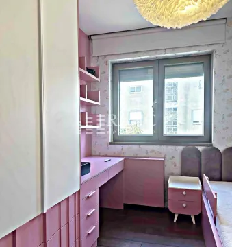 Children's bedroom with a bed, desk, and wardrobe. - image 7
