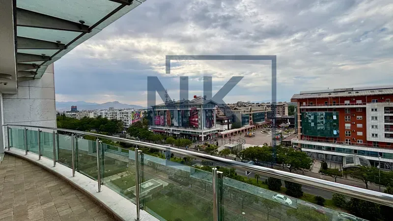 Spacious terrace with a city view.