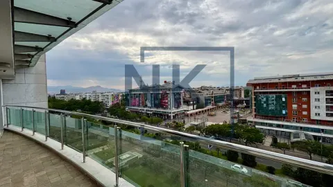 Spacious terrace with a city view. - image 20