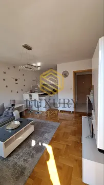 Modern living room connected with the dining area and kitchen. - image 10