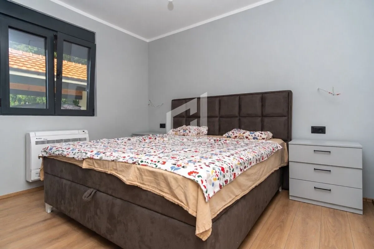 Bedroom with a double bed and bedside tables.