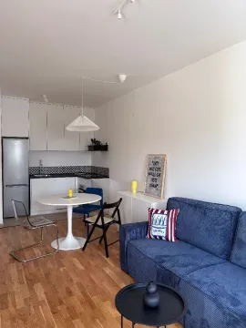 Living room with kitchen and dining area in modern style. - image 2