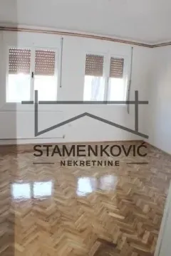 Empty room with hardwood parquet flooring and white walls. - image 13