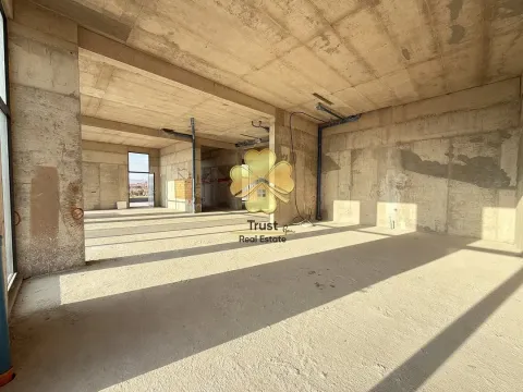 Unfurnished commercial space in grey construction phase. - image 3