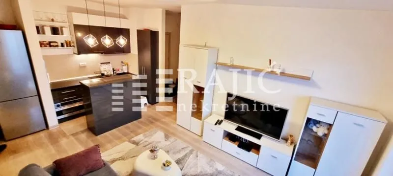 Living room connected to the kitchen.
