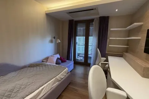 Children's bedroom with a bed, desk, and access to the terrace. - image 9