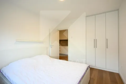 Bedroom with a double bed and a fitted wardrobe. - image 6