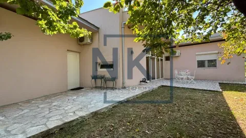 View of the courtyard and paved terrace of the family house. - image 5