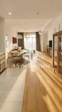 Spacious living room connected to the dining area and kitchen. - image 5