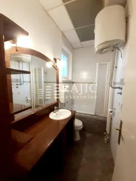 View of the bathroom with a sink, mirror, and bathtub. - image 17