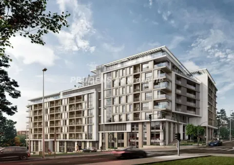 Spoljašnji pogled na modernu višespratnu stambenu zgradu sa terasama i ulicom u prvom planu. - image 20