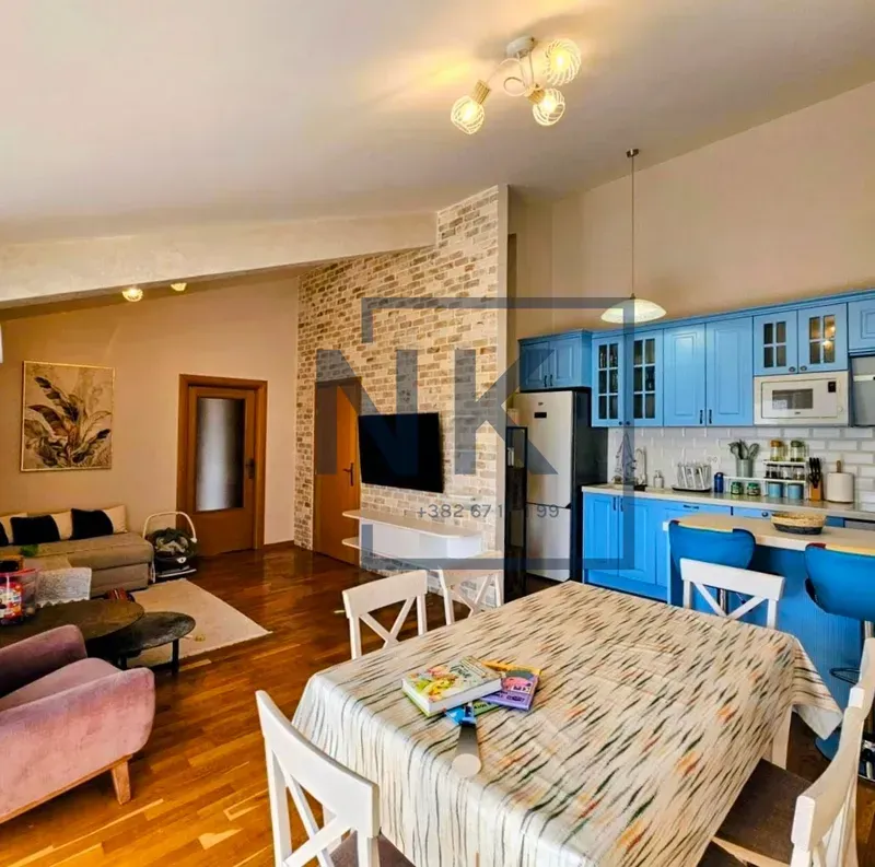 Spacious living room connected to the kitchen and dining area.