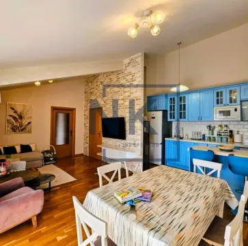 Spacious living room connected to the kitchen and dining area. - image 3