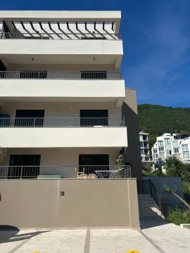 Exterior view of a modern residential building with balconies. - image 16