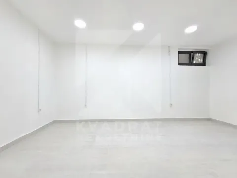 Empty bright room with white walls and a small window near the top. - image 12