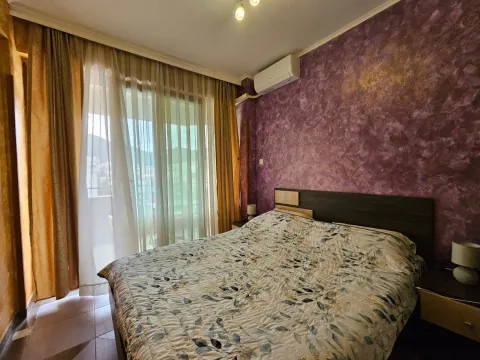Bedroom with a double bed and access to the terrace. - image 7