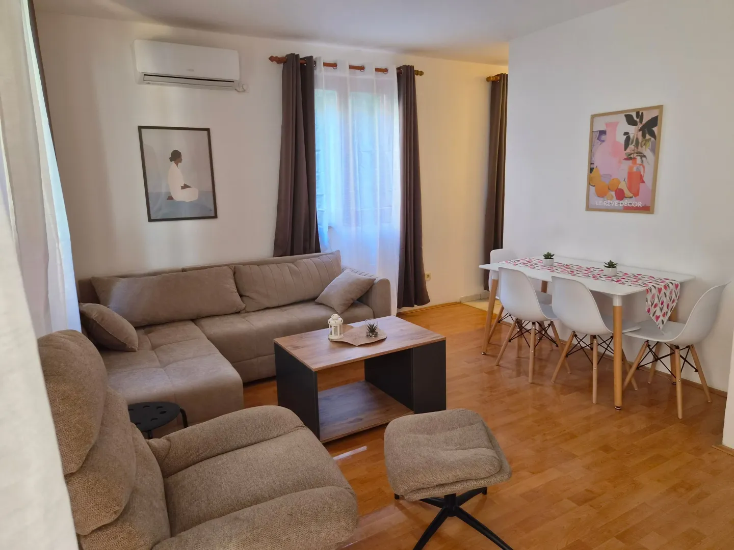 Spacious living room connected with the dining area.