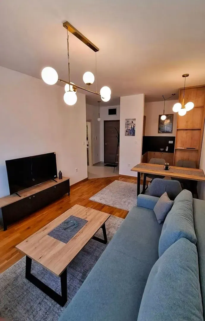 Modern and bright living room with a dining area.