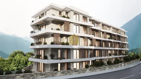 Exterior view of a modern residential building with terraces and mountain surroundings. - image 6