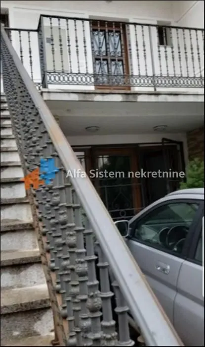 Exterior view of the stairs and building entrance.