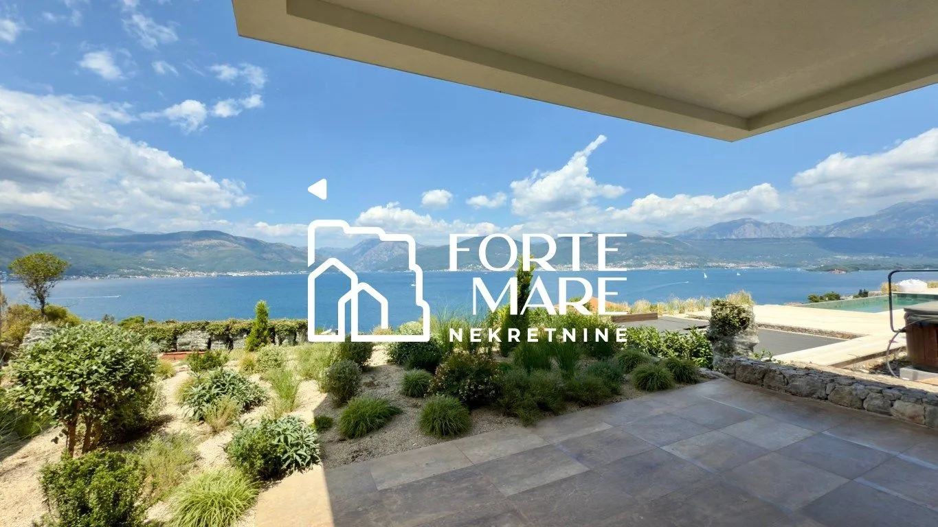 View from the terrace towards the sea and mountains.