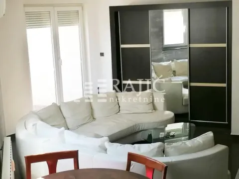 Living room with a sofa set and dining table. - image 7