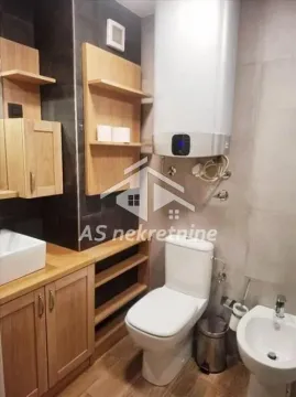 Manje kupatilo sa wc šoljom, bideom, umivaonikom i bojlerom. - image 17
