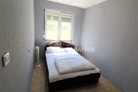 Smaller bedroom with a double bed and a window. - image 5