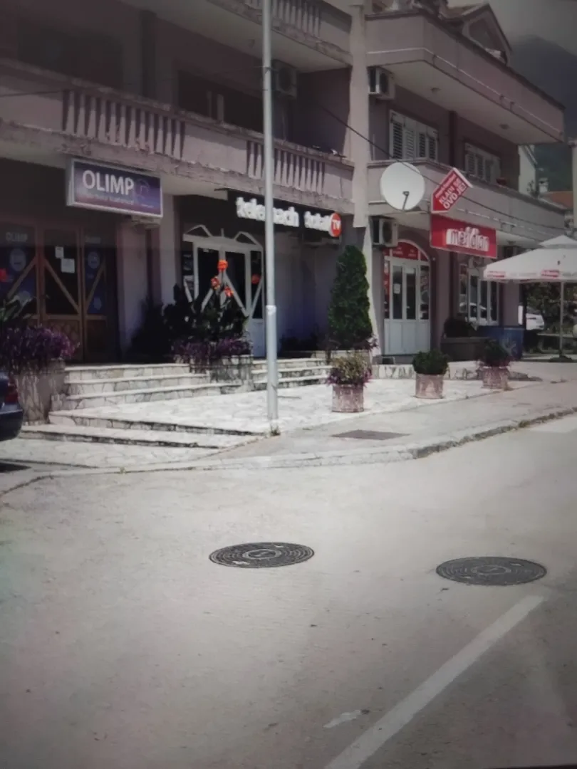 Exterior view of a commercial building with ground floor premises.