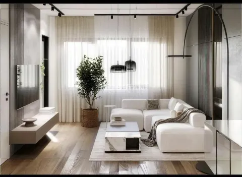 Modern and bright living room with a white sectional sofa and a TV. - image 11