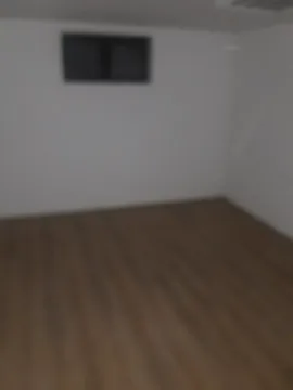 Empty room with laminate flooring. - image 6