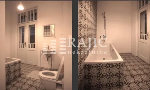 Overview of the bathroom with a bathtub and sanitary facilities. - image 11