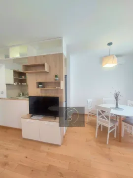 Living room with dining area and view of the kitchen. - image 11