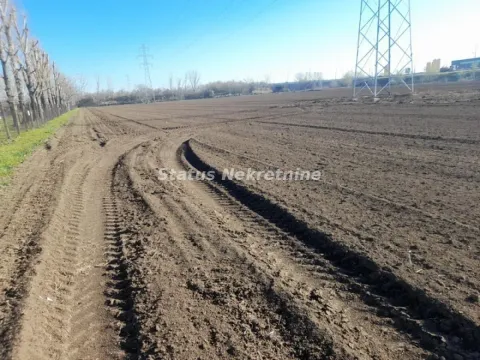 Pogled na prostrano poljoprivredno zemljište sa zemljanim putem. - image 7